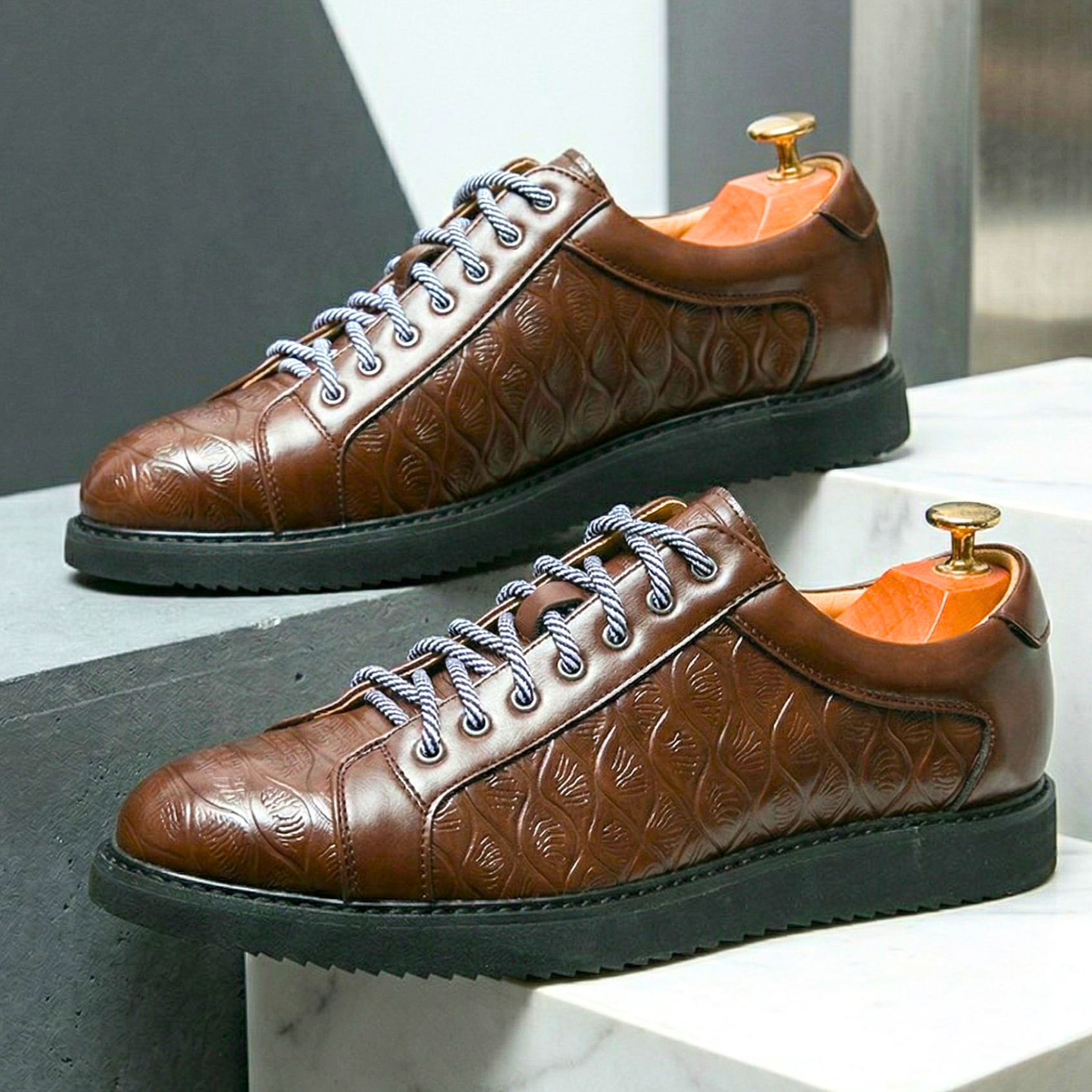 Montero Embossed Leather Sneakers